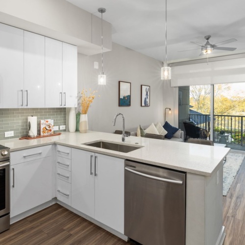 a kitchen with white cabinets