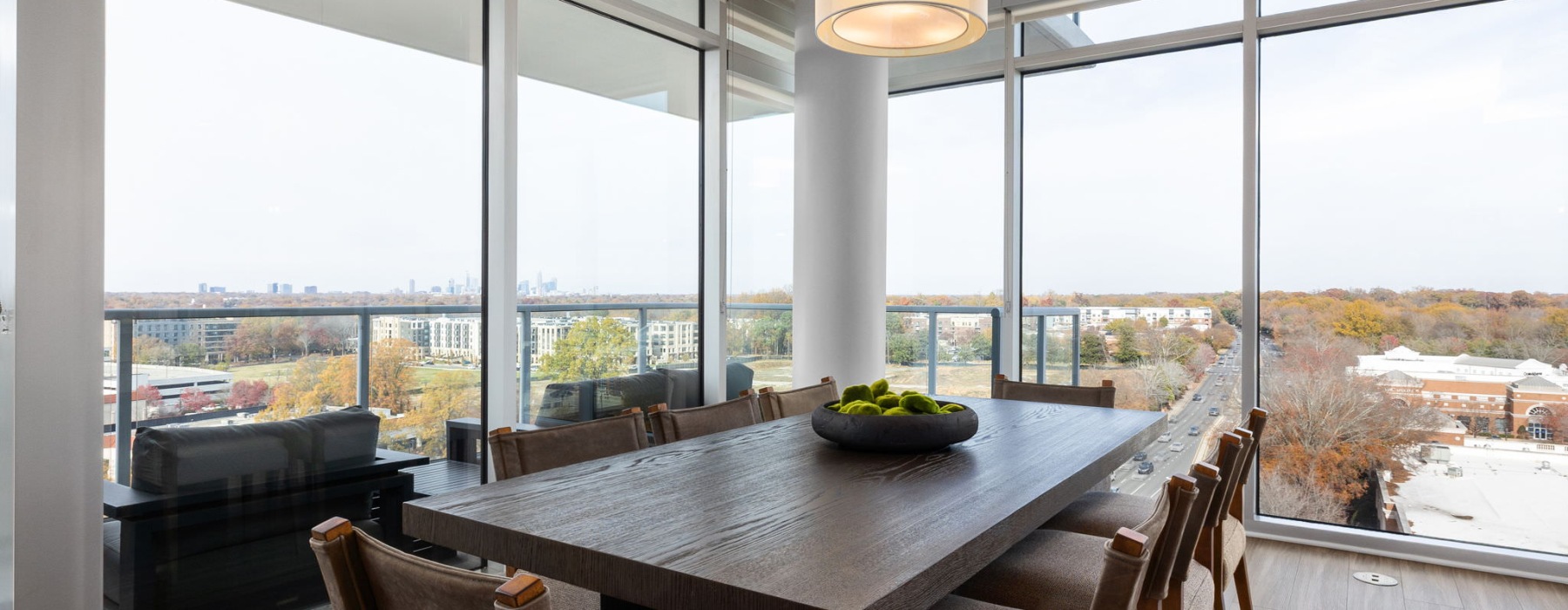 a dining room with a table and chairs