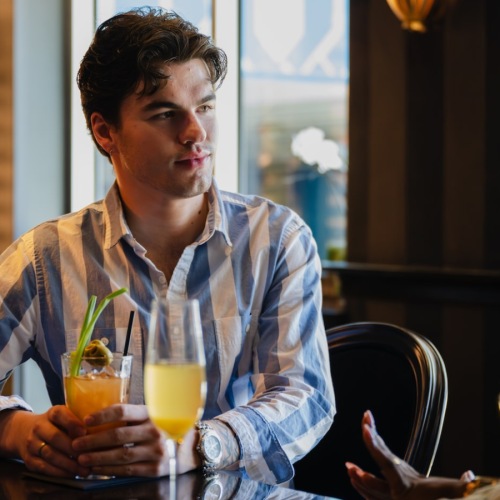woman talking to a man in a bar woman talking to a man in a bar