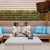 a couple reclines in outdoor lounge