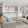 White couches and chairs inside penthouse apartment