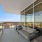 Gray outdoor seating on apartment balcony